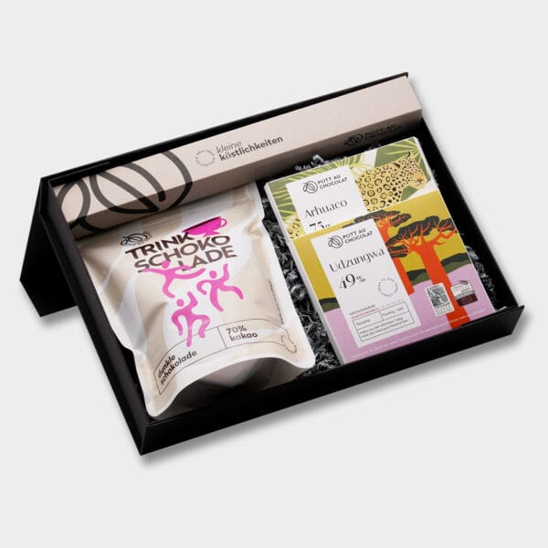 Geschenkbox mit verschiedenen Produkten von Pott au Chocolat: Trinkschokolade, eine Pralinenstange mit 10 Pralinen und zwei Tafeln Schokolade